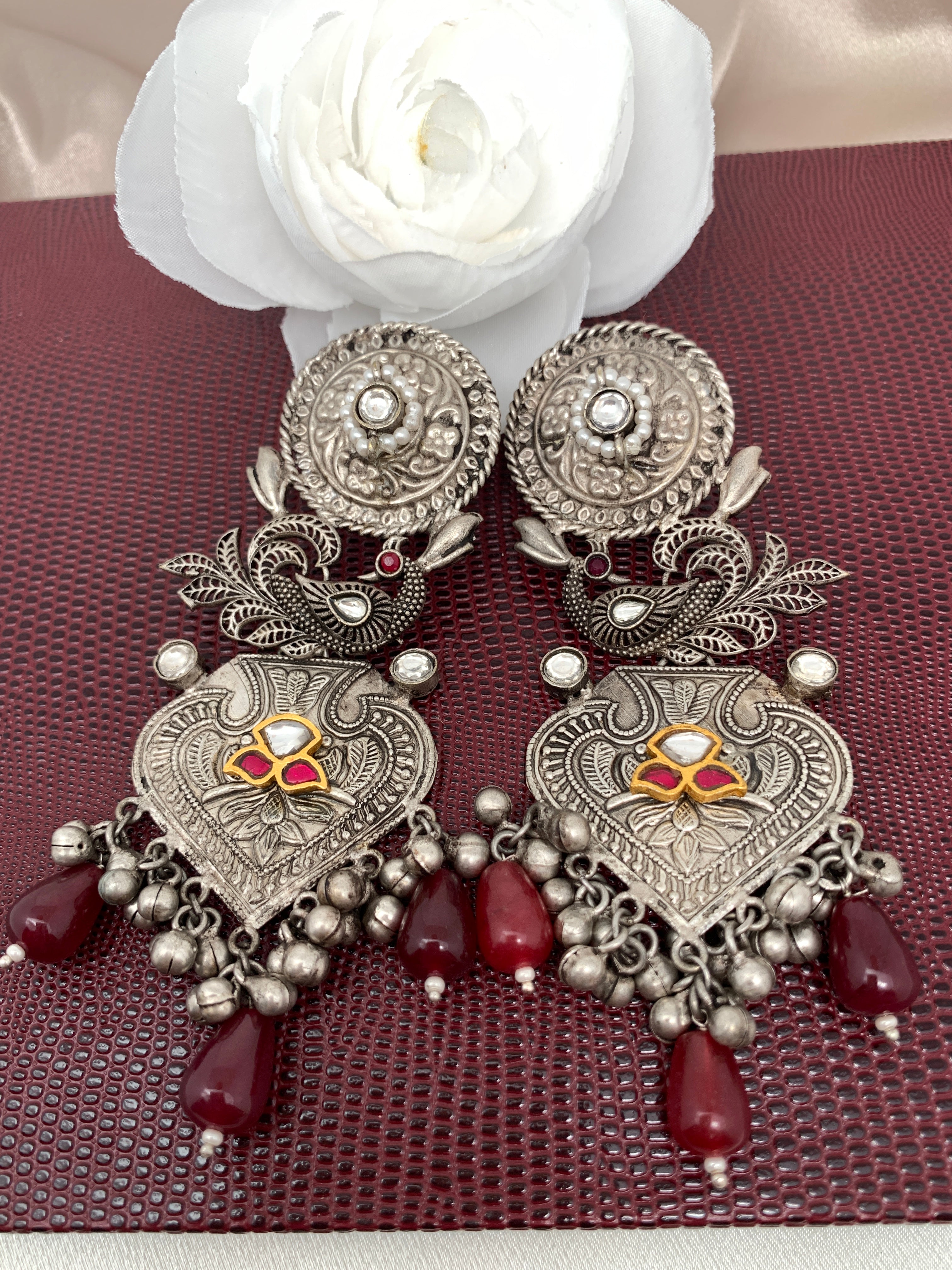 Buy Black Stone Studded German Silver Earrings with Brass Jhumki at  Amazon.in